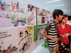 Politische Cartoons ausgestellt bei einer Veranstaltung für Frieden, Yangon 2013